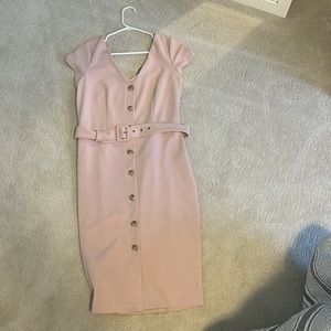 Beautiful light pink dress. Fake buttons down with belt,